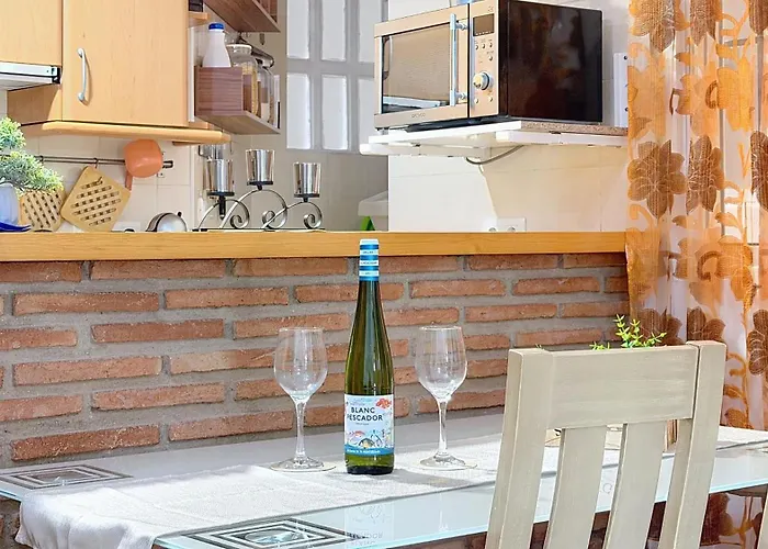 Center By South Costa * Nerja