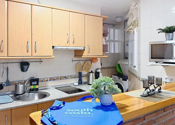 Center By South Costa * Nerja